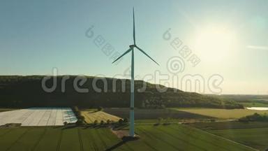 夏季的一天，农业领域的风车涡轮机-清洁和可再生能源的能源生产